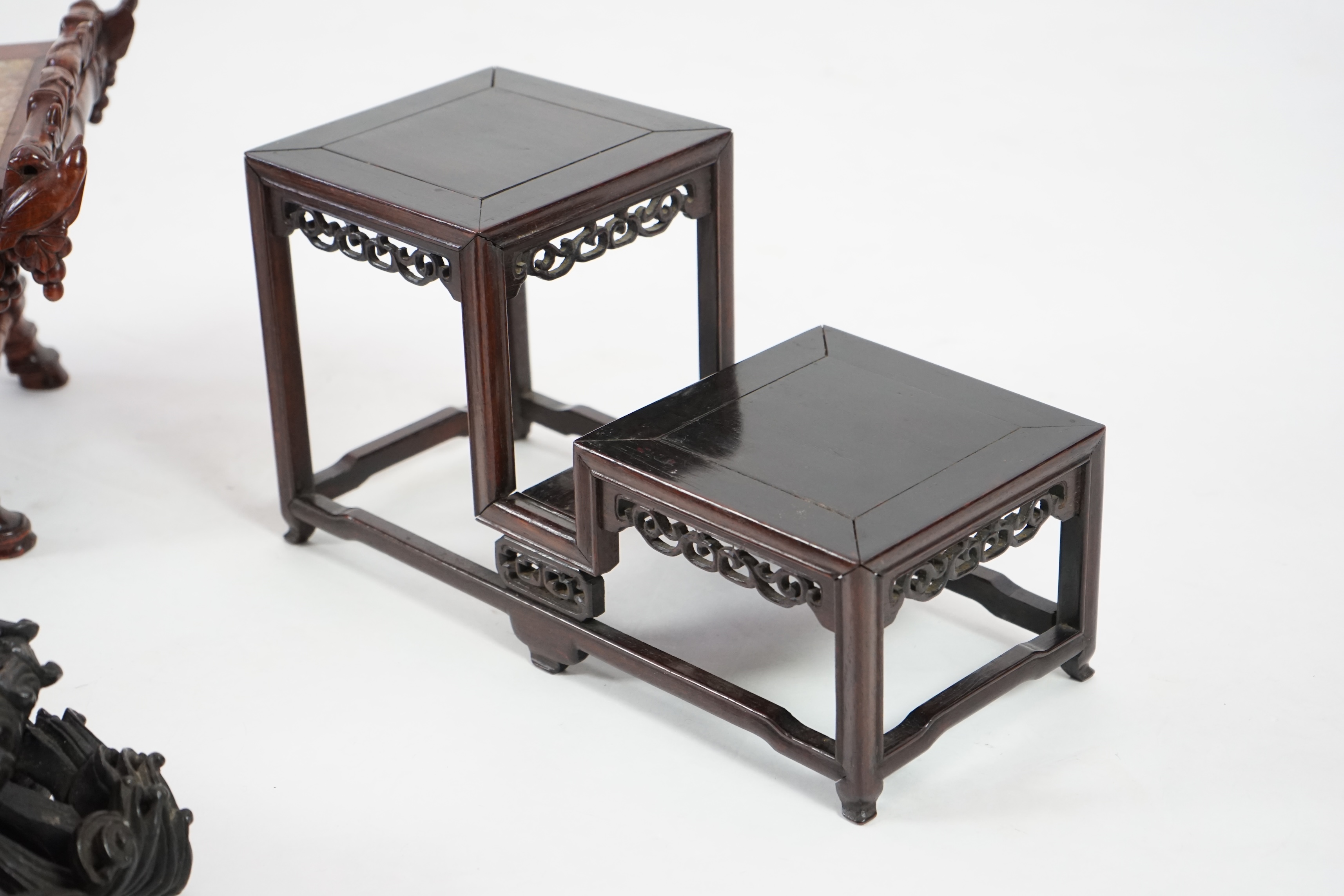 Three Chinese carved wood stands, 19th/early 20th century